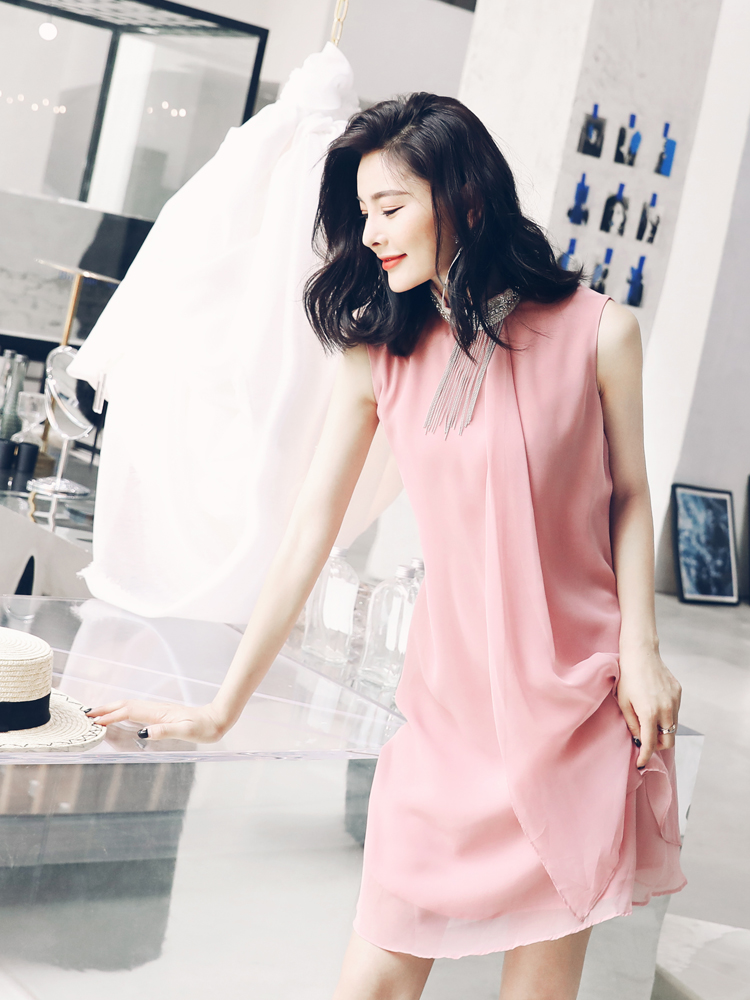 S秀韓版名媛氣質2018夏季新款流蘇波浪無袖連衣裙純色不規則裙子